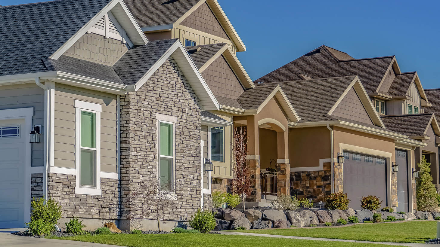 Row of newly constructed houses seen while preforming home inspection services